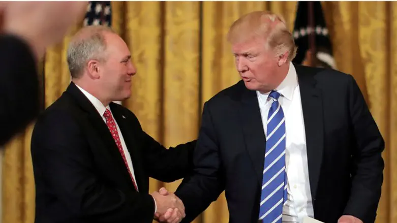 U.S. President Trump shakes hands with Scalise (file)