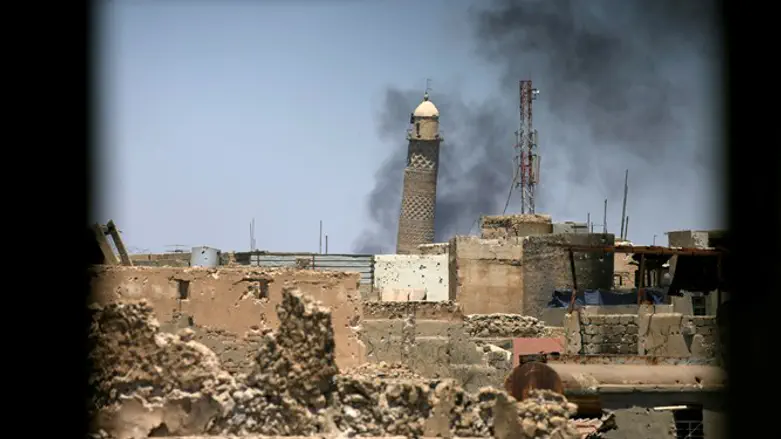Smoke rises from Grand al-Nuri mosque in Mosul