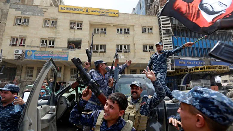 Iraqi forces celebrate recapture of Mosul from ISIS terrorists