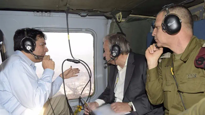 Danny Danon and Antonio Guterres on a helicopter tour