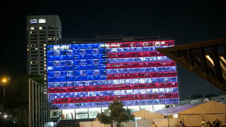 Tel Aviv city hall lit up with the American flag
