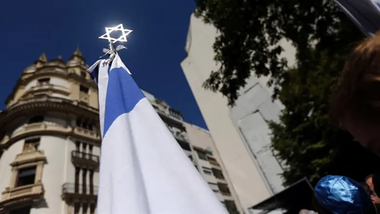 Star of David in front of outline of former Israeli embassy in Buenos Aires