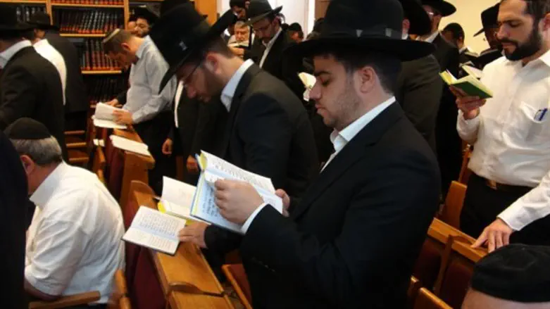 Haredi praying in a synagogue (illustrative)