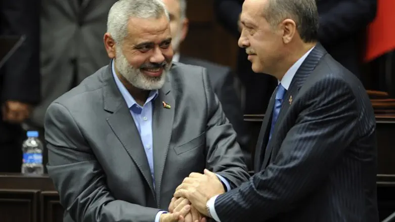 Recep Tayyip Erdogan (R) and Hamas Gaza leader Ismail Haniyeh