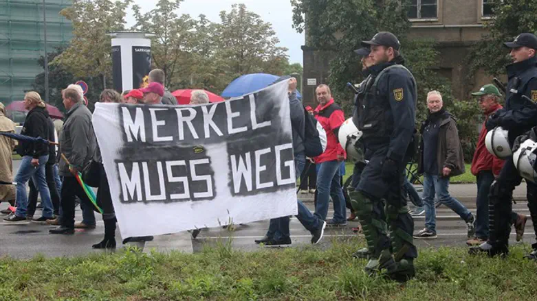"Merkel must go"