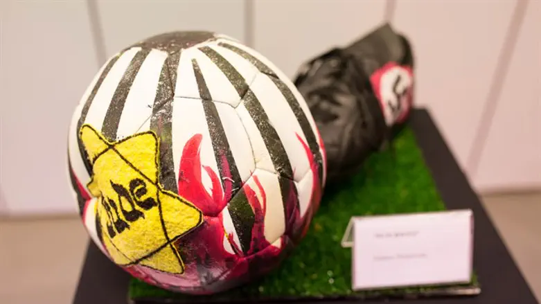 The exhibition at River Plate's museum includes six illustrated soccer balls.
