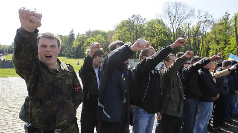 Members of Ukrainian nationalist organizations shout slogans
