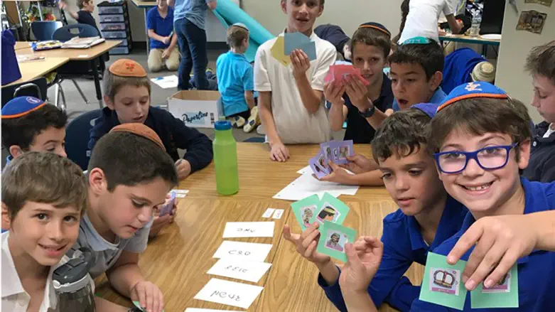 Fourth graders at Yeshivat Noam in New Jersey play a game involving the story of Joseph.