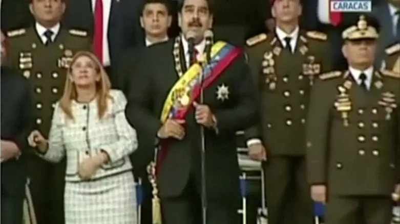 Maduro reacts as drones detonate during his speech