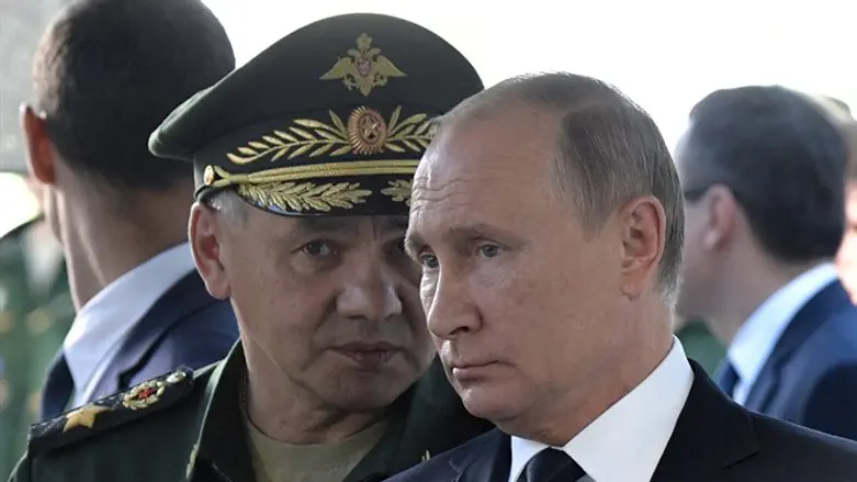 Russian President Vladimir Putin and Defence Minister Sergei Shoigu
