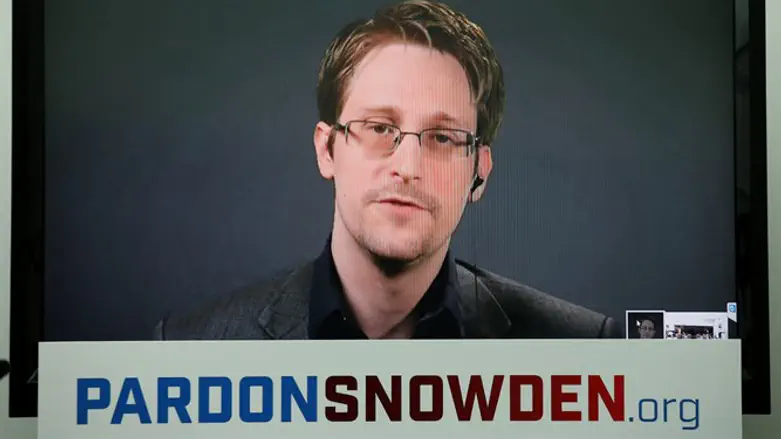 Edward Snowden speaks via video link during news conference in New York