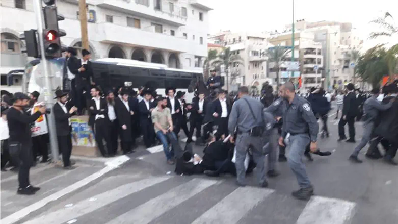 Police and haredi demonstrators clash in Bnei Brak