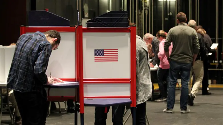 Voters fill in their ballots in the US midterm election