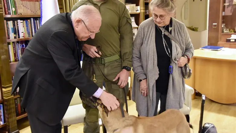 Rivlin and his wife with Rambo the dog