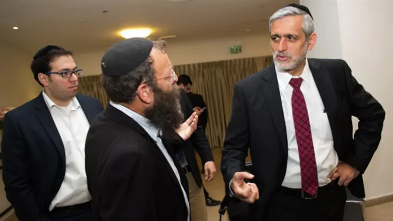 Baruch Marzel (center-left) and Eli Yishai (right)