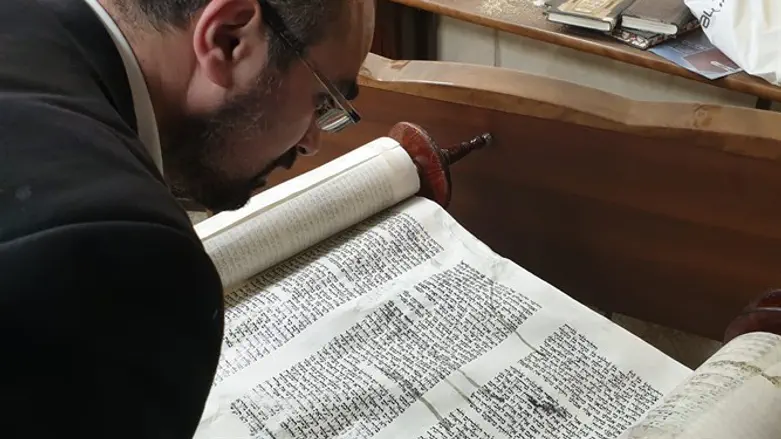 One of the desecrated Torah scrolls