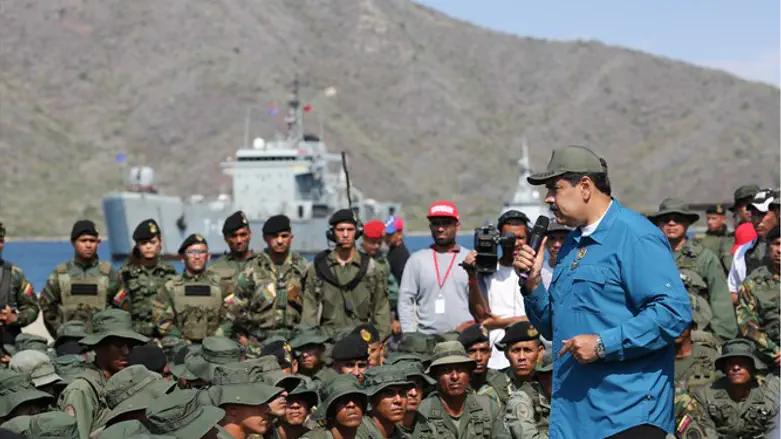 Venezuela's President Nicolas Maduro speaks to soldiers