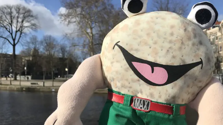 A puppet of Max the Matzah at a park in Amsterdam