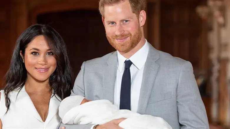 Harry and Meghan with Archie.