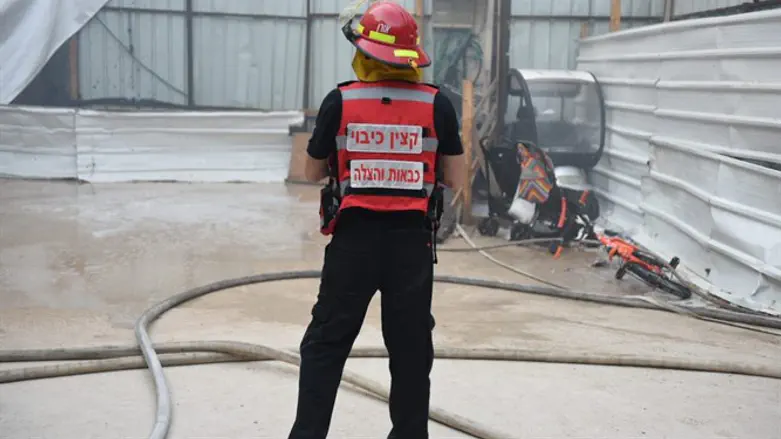 Firefighters battling blaze in Jerusalem residential building
