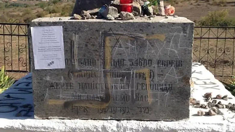 Vandalized monument to Holocaust victims in Bogdanovka, Ukraine