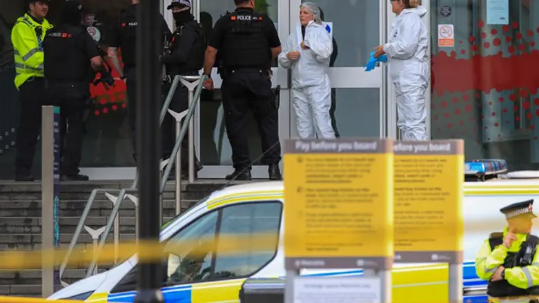 Police at scene of stabbing in Manchester