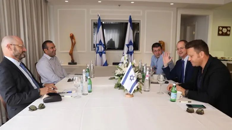 Negotiating teams of Blue and White and Yisrael Beytenu