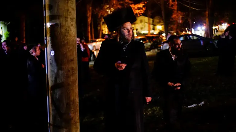 Locals gather outside of scene of machete attack in Monsey, December 29th 2019