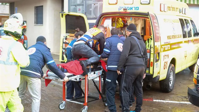 Magen David Adom paramedics evacuate injured person (illustrative)