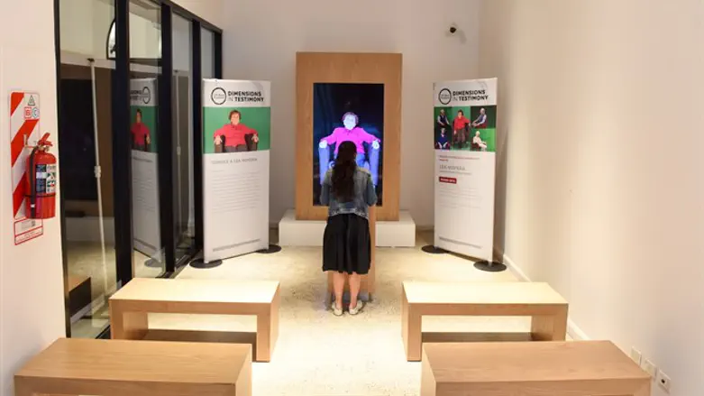 A view inside the Holocaust survivor hologram exhibition with the testimonies