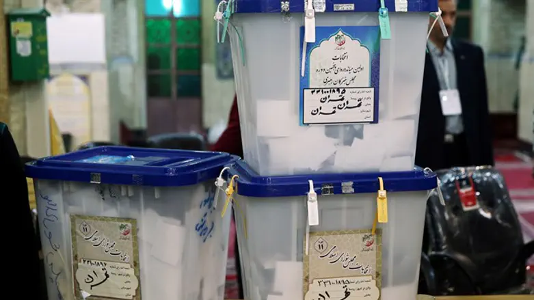 Full ballot boxes after parliamentary election in Tehran