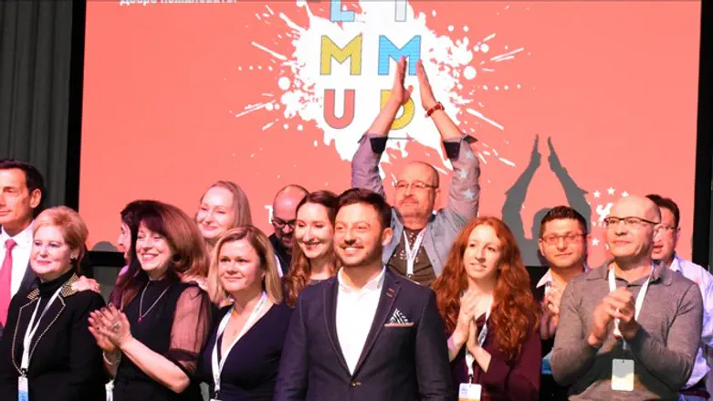 Limmud FSU's Europe team and organizational leaders celebrate at the Vienna conference
