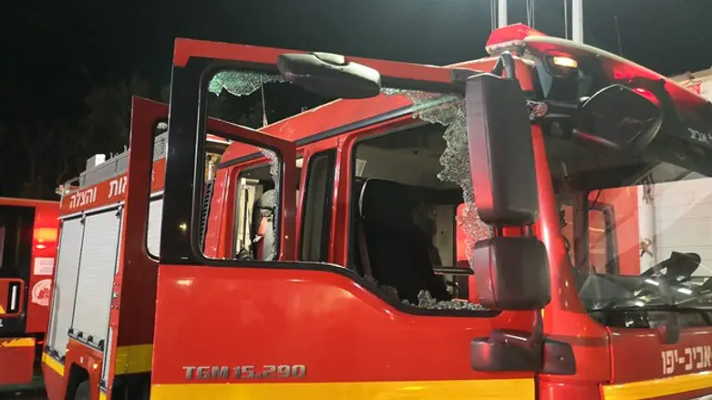 Firefighting vehicle damaged by rocks