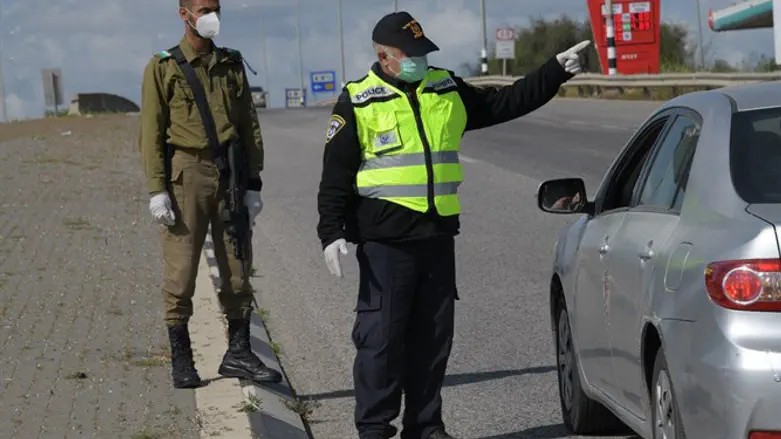 policeman, soldier enforce lockdown