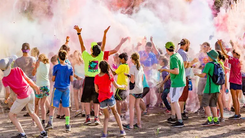 Color war at Ranch Camp, in 2017. This year, families may replace the crowds of kids.