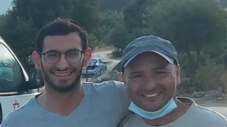 Afiw(right) with father of baby after rescue