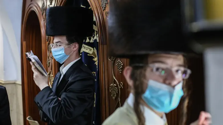 Hasidic Jews wear face masks