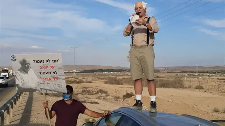 Regavim activist dressed as David Ben-Gurion
