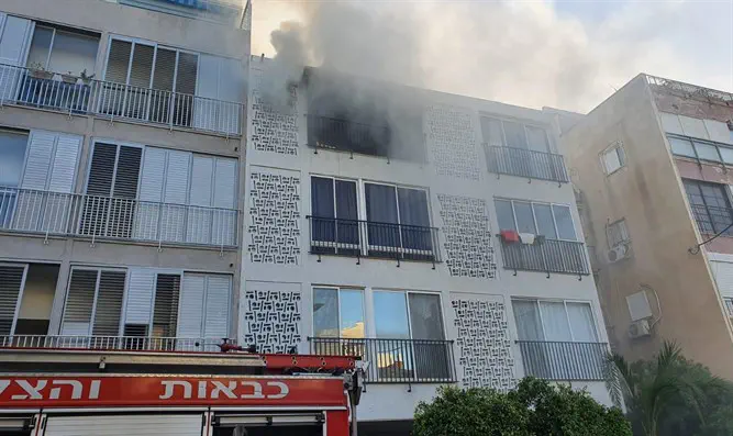 אישה חולצה משריפה בתל אביב-ערוץ 7 