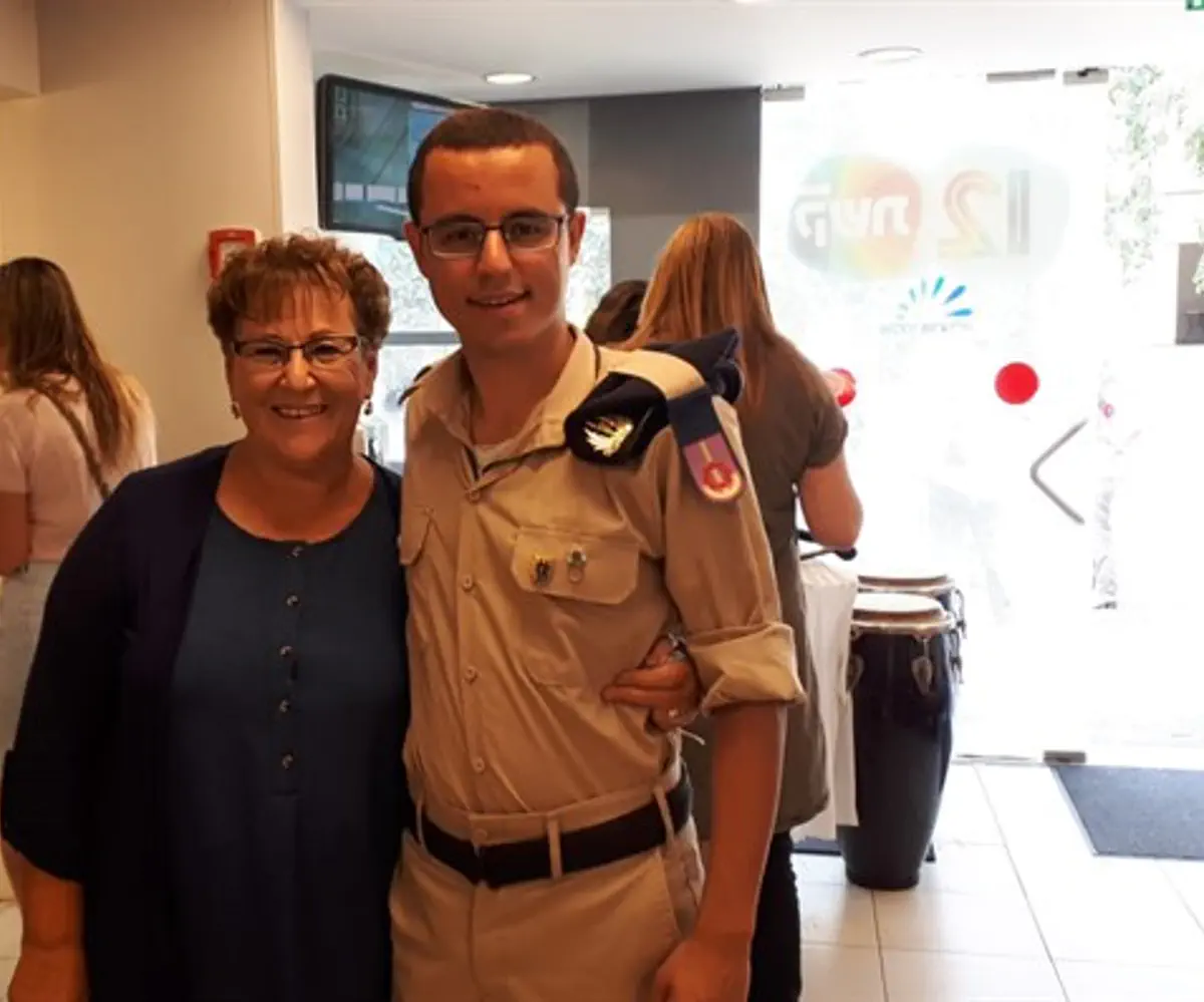 Miriam Peretz with one of the soldiers