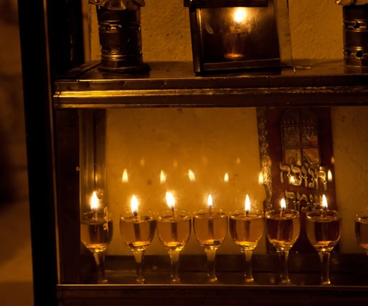 A Hanukkah menorah in Israel glows with the light of olive oil, not candles.