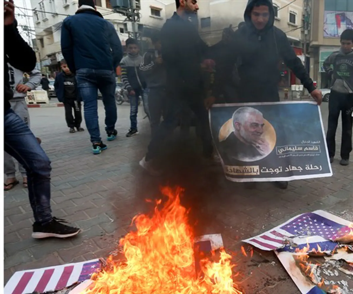 Iranians burn Israeli, American flags