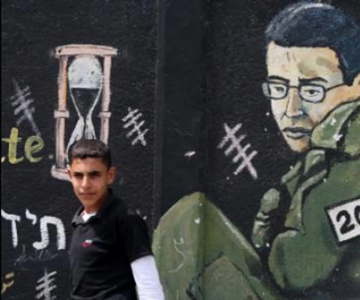 Gilad Shalit graffiti on wall in Jabaliya