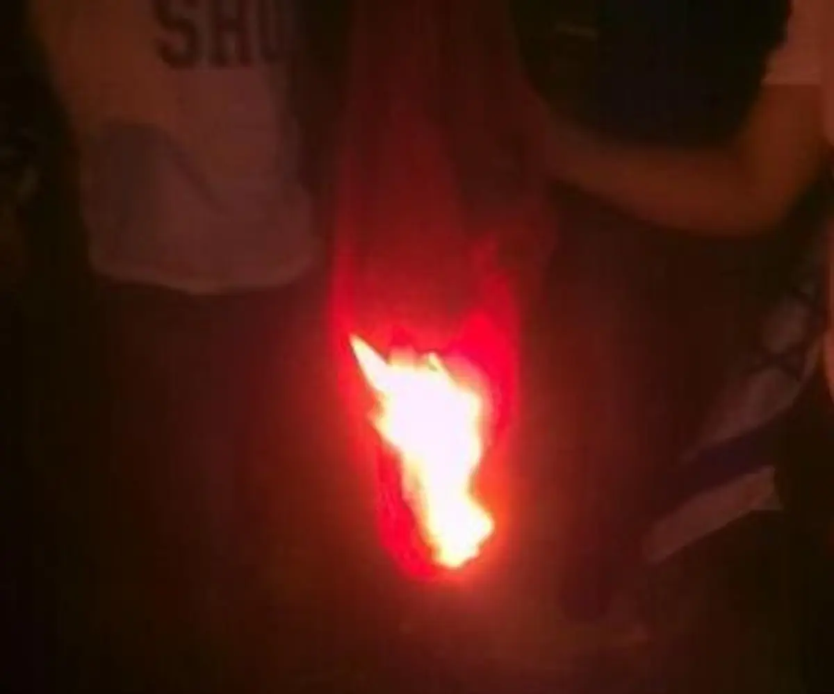 Burning Turkish flag (or shirt?) at protest