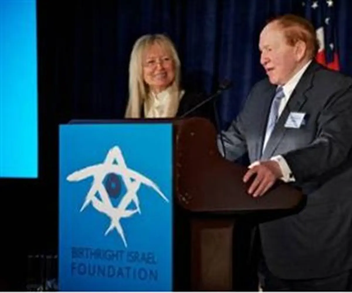 Adelsons at a Birthright reception