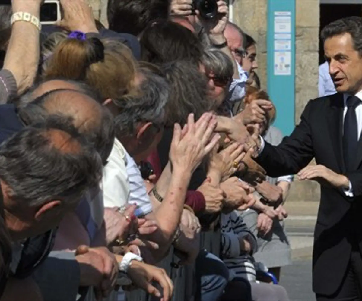 Nicolas Sarkozy Gladhands French Voters