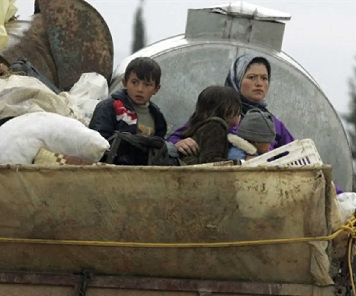 Syrian family flees into Lebanon