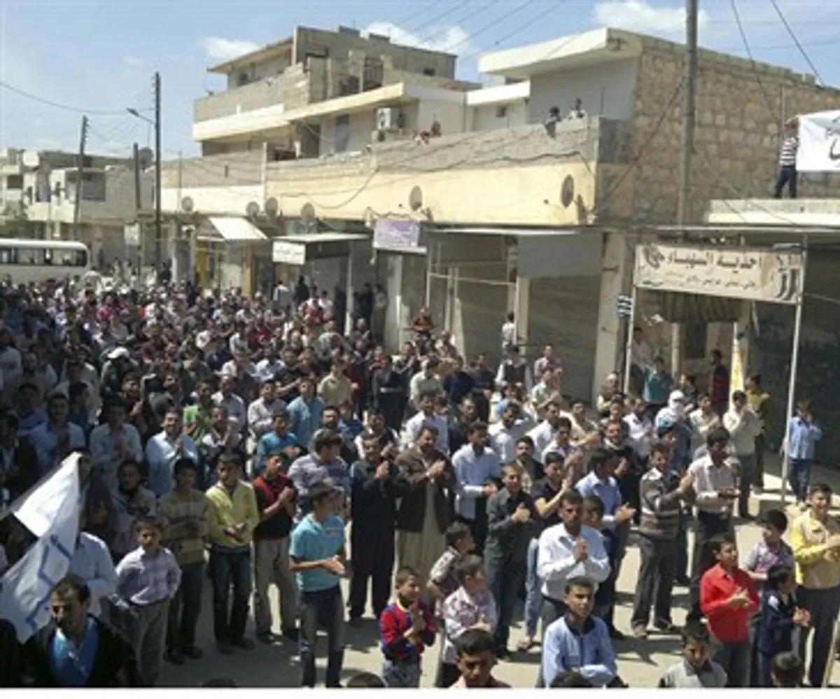 Syrian demonstrators protest near Aleppo