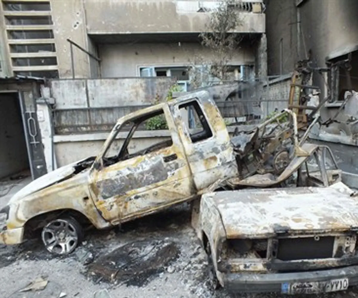 Vehicles destroyed by gov't shelling in Homs