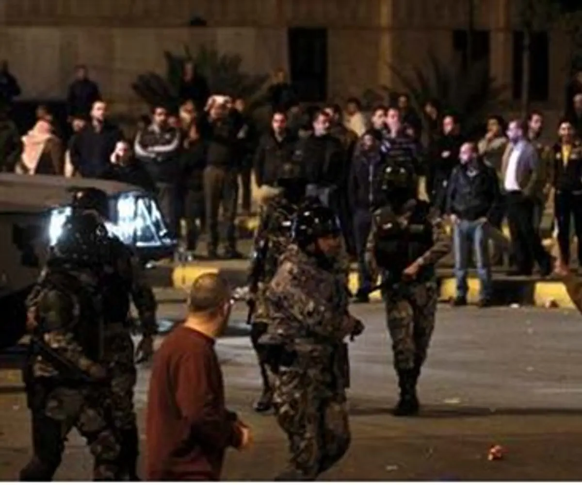 Jordanian police face rioters